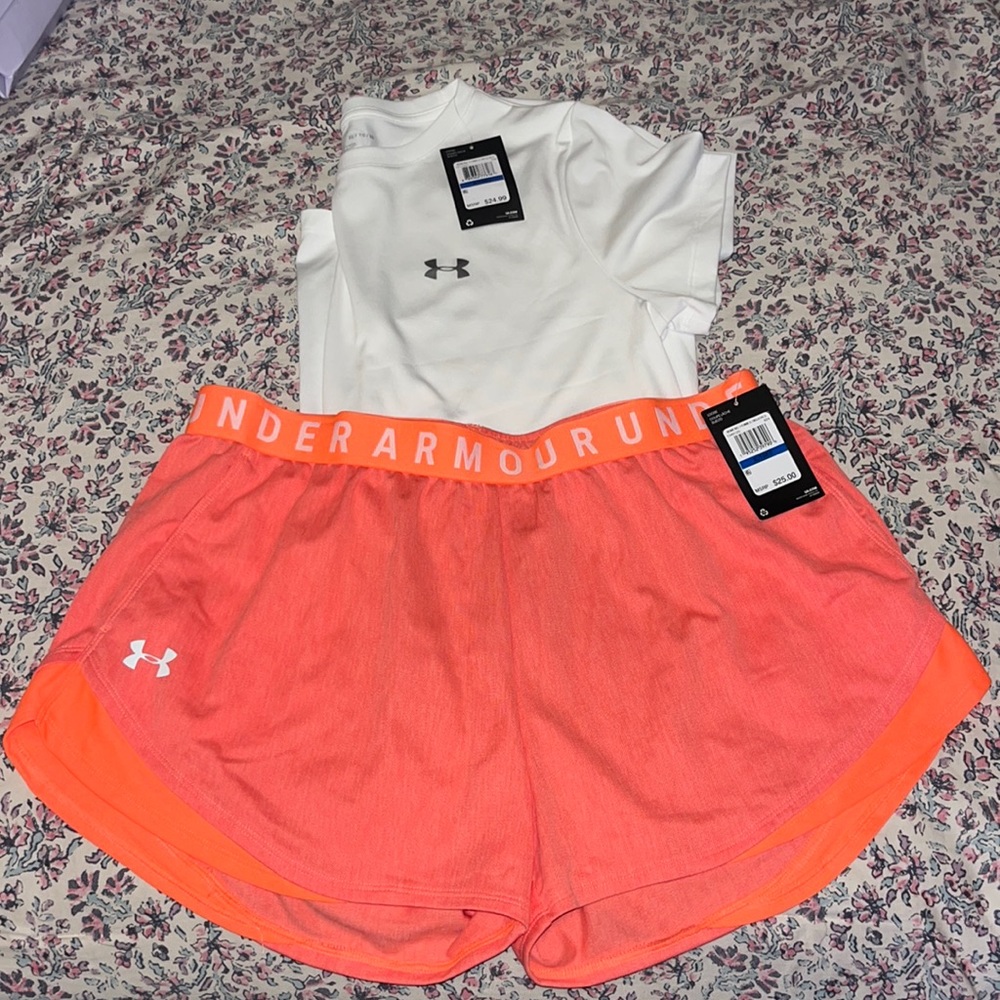 Under Armour white shirt and neon shorts